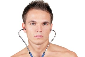 Portrait of a fit young man wuth stethoscope in his ears