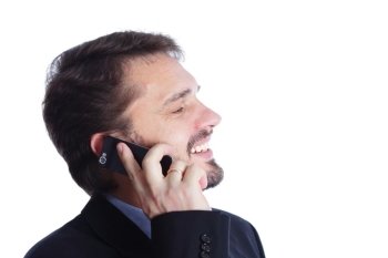 Mature businessman laughing on cellphone