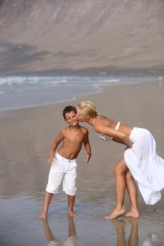 Mother and son on the beach