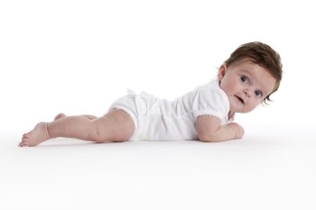  Baby girl lying on her belly full lenght on white background