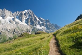 small path in Ferret Valley, Courmayeur, Italy