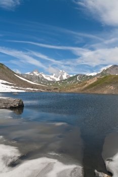 small lake in Pointe Rousse pass, Aosta valley, Italy 