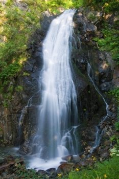 beautiful waterfall in Val di sole, Trentino, Italy