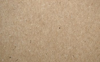 Brown cardboard sheet useful as a background. Corrugated cardboard