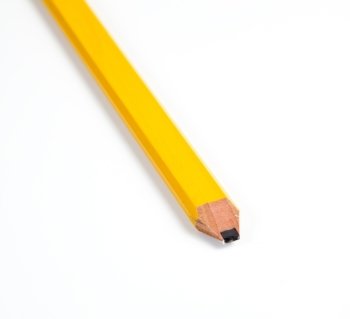 Close up of a wooden carpenter’s pencil with broad sharpened point