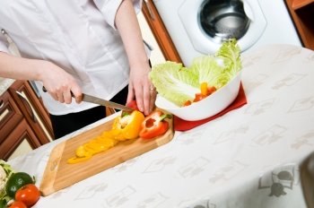woman in the kitchen preparing a vegetarian meal