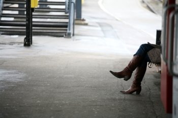 trains, stations, passenger and travellers: legs of girl waiting a train
