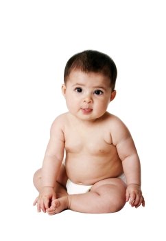 Beautiful cute happy Caucasian Hispanic baby infant sitting, wearing white diaper, isolated.
