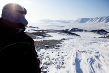 A winter adventure guide on a barren winter landscape