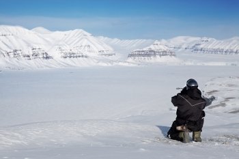 A winter wilderness adventure guide.  Spitsbergen, Svalbard, Norway