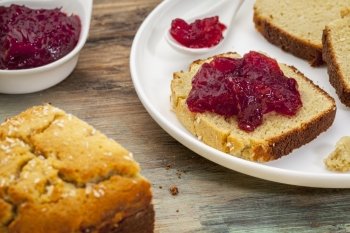 slices of freshly baked, gluten free, coconut flour bread with cranberry sauce
