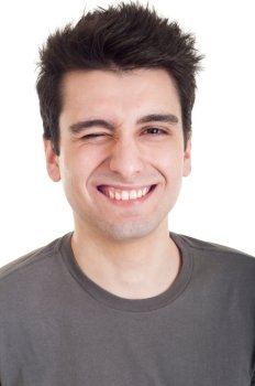 cheerful young man winking and smiling isolated on white background