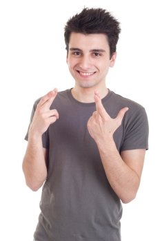 smiling casual man with crossed fingers isolated on white background