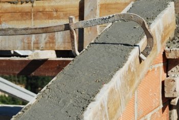 roof house under construction (cement and brick wall)