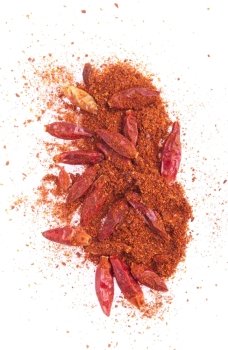 spicy chili powder with dry red peppers isolated on white background (chaotic version)