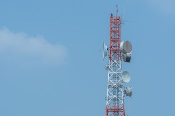 Telecommunication tower structure with blue sky background 
