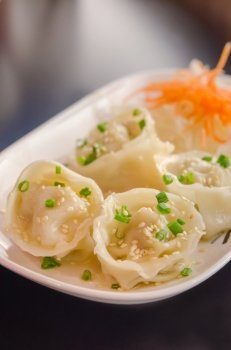 Mandu  , Korean Dumplings , Boiled Pork Gyoza on dish