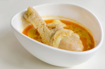 Massaman curry. asian yellow curry chicken in white bowl ( Massaman )
