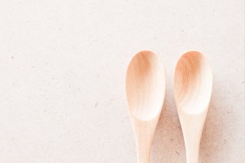 Closeup top view of  two wooden spoons, stock photo