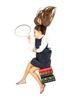 Conceptual isolated photo of cute thoughtful schoolgirl sitting on books