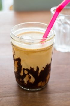 Iced coffee with chocolate sauce, stock photo