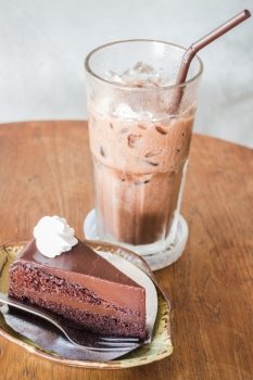 Delicious chocolate cake and cold drink, stock photo