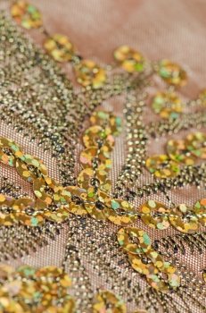 Fabric texture with spangles, sequin to background.