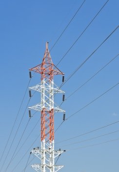 Transmission tower in blue sky