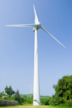 Wind power generation machine under blue sky