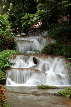 a waterfall in the Tropical Forest near the Village of Fang north of the city of chiang mai in the north of Thailand in Southeastasia. 


