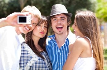 Group of College students standing together taking a self portrait