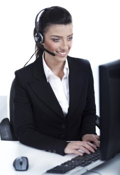 Customer support woman with headset at office over isolated white background