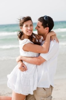 love couple Hugging on the beach, outdoor