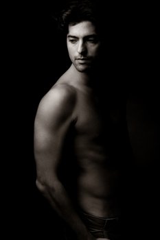sexy Fashion shot of young man in studio,indoor