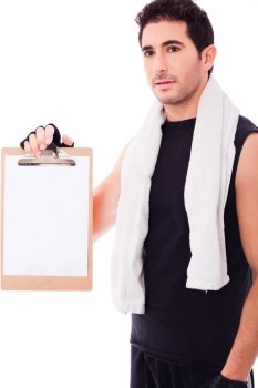 Fitness Man showing a blank clip board on a isolated white background