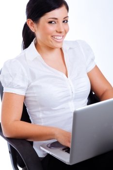 Young attractive business woman smiling while surfing the net ,Indoor studio