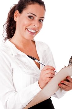 Young business woman writing in a clip Board,on a white isolated backgroud