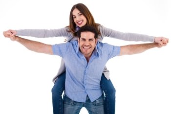 Front view of a couple in piggy back ride on a white isoalted background