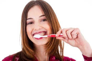 Women brushing her teeth on a white background