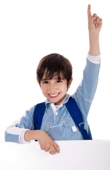 Elementary school kid raising his hand on isolated white background