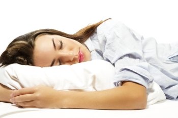 closeup of a sleeping woman. closeup of a sleeping woman on white background