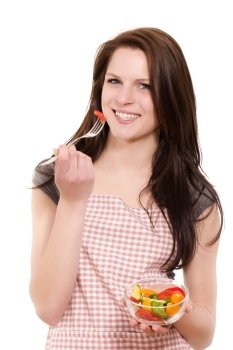 young woman eating salad. happy beautiful young woman eating salad on white background