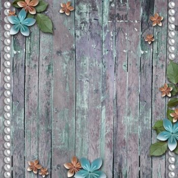 Old wooden background with a flowers, pearls