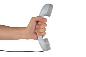 Telephone receiver in hand, isolated on white background, help line Information Support Concepts