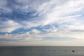north sea with clouds and blue sky in Holland