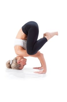 Sport Series: Young Blonde Woman doing Yoga. Balance on the three supports