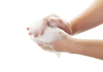 Washing your hands is the best way to prevent flus, colds and other germs and viruses,  Shot on white background.