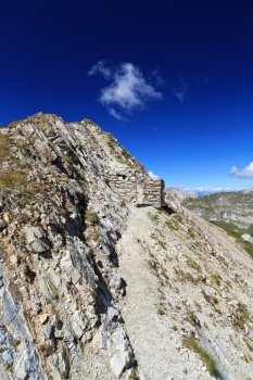 alpine pathway between first world war trench in Italian Dolomites