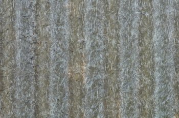 Rough fiber glass texture macro. Abstract grungy background.