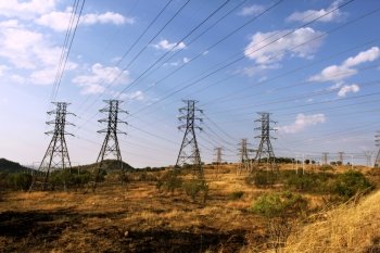 Picture of Large Power Cable Towers Running Through Rural Area